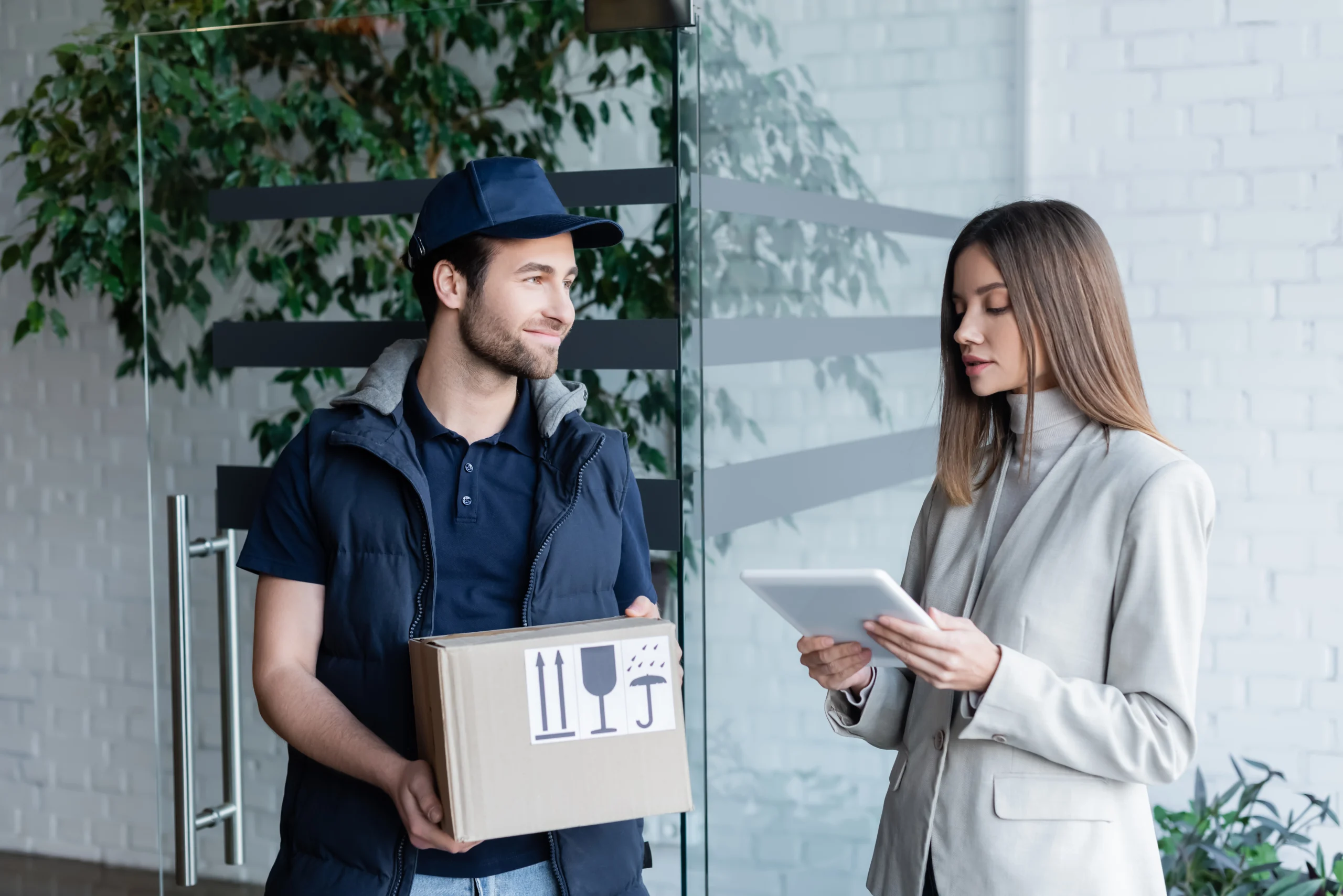 Customer using last mile delivery tracking to receive a parcel
